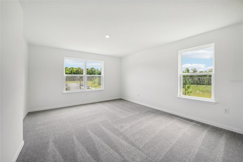 1873 Shadow Box Bend St. Cloud, FL 34771 - Photo 12 of 27 an empty room with windows