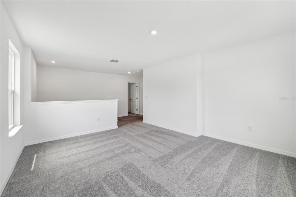 1873 Shadow Box Bend St. Cloud, FL 34771 - Photo 14 of 27 a view of an empty room