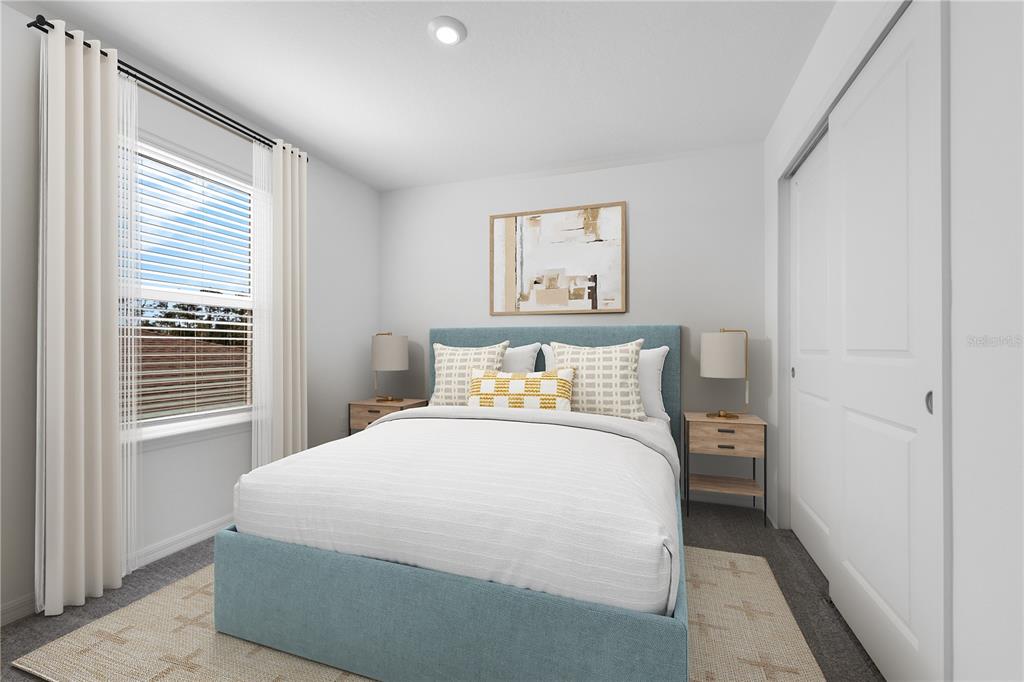 1873 Shadow Box Bend St. Cloud, FL 34771 - Photo 15 of 27 a bedroom with a bed and a window