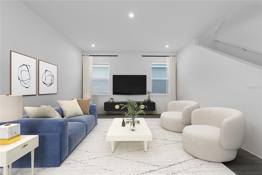 1873 Shadow Box Bend St. Cloud, FL 34771 - Photo 6 of 27 a living room with furniture and a flat screen tv