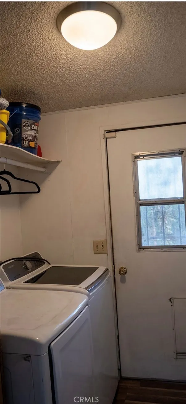 7717 Church Street, Unit 54 Highland, CA 92346 - Photo 11 of 13 a room with storage and utility