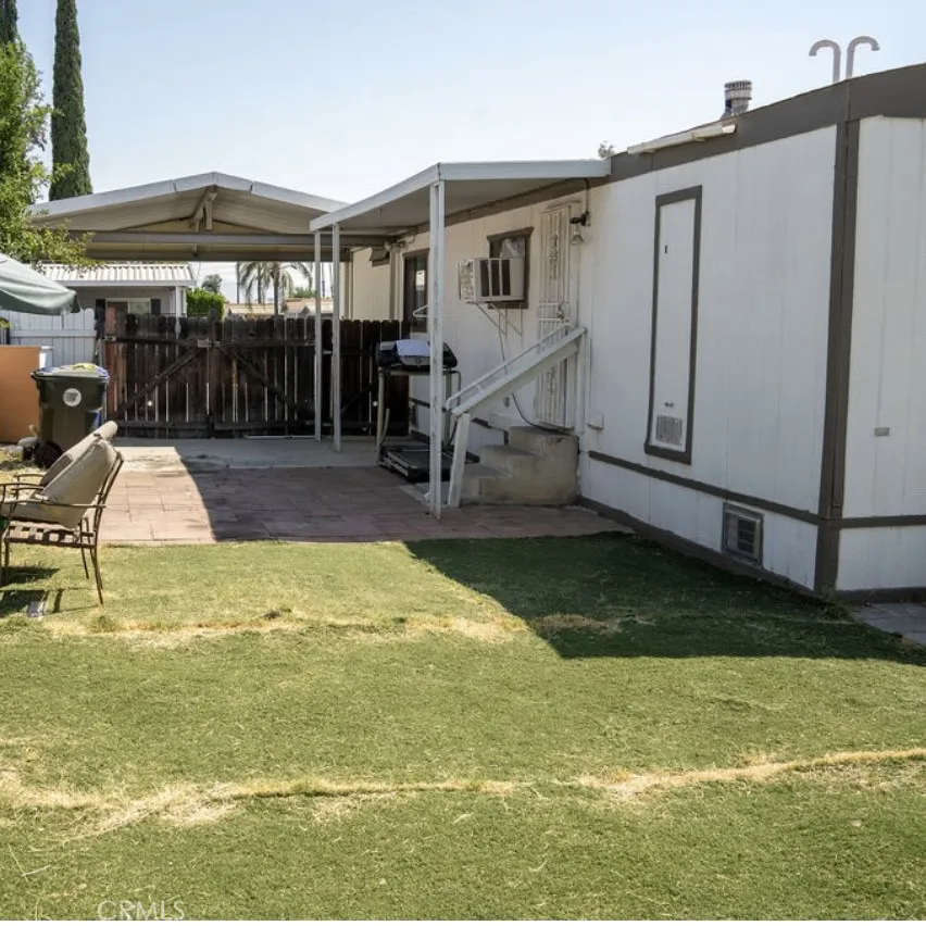7717 Church Street, Unit 54 Highland, CA 92346 - Photo 12 of 13 a view of swimming pool with a patio
