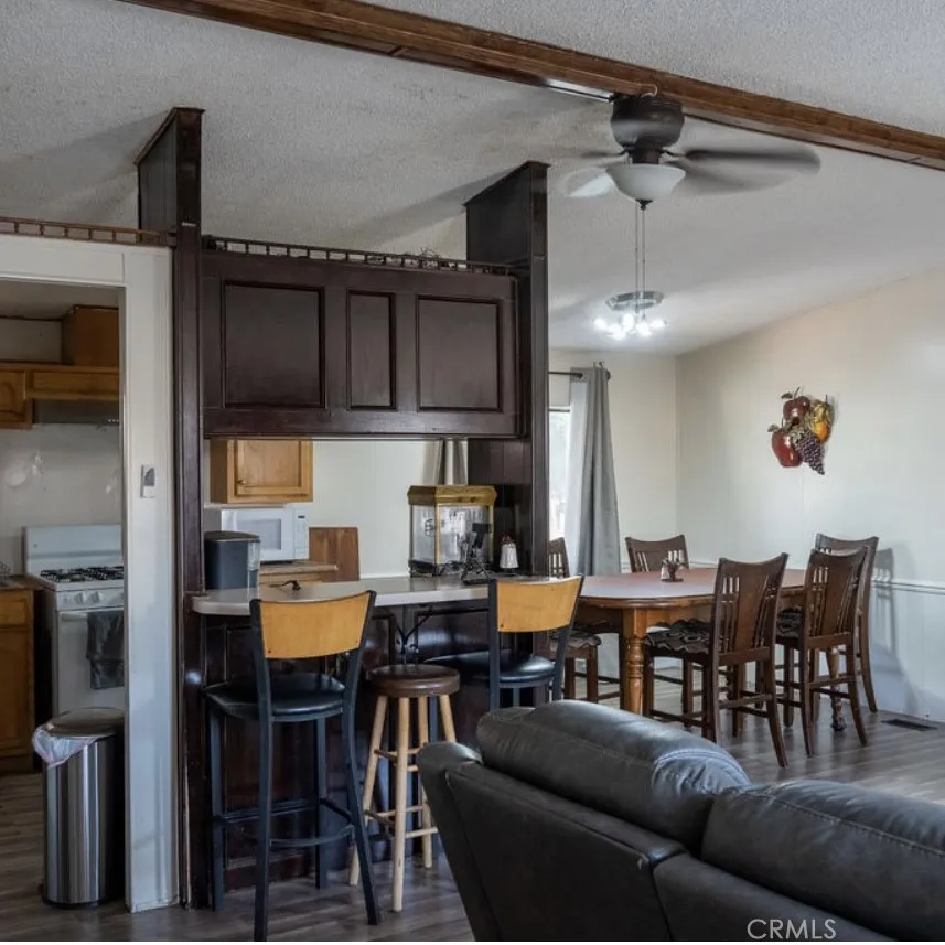 7717 Church Street, Unit 54 Highland, CA 92346 - Photo 5 of 13 a view of a dining room with furniture