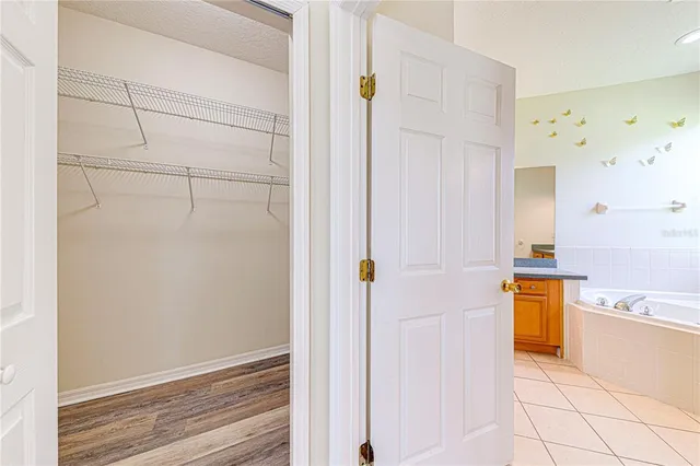 a view of a hallway with washer and dryer