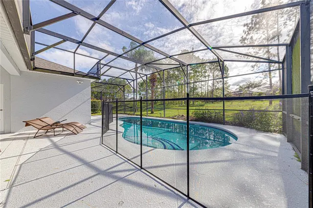 a room with furniture and air conditioner