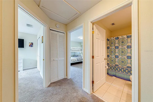 an aerial view of a house with a swimming pool yard and outdoor seating