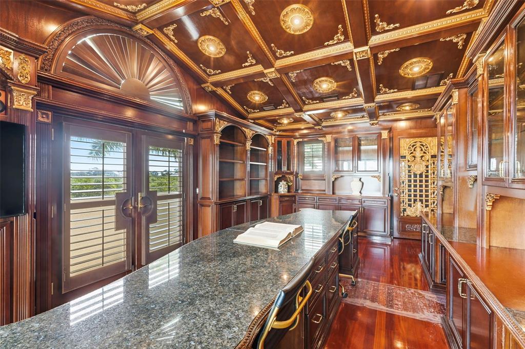 2115 Alexis Court Tarpon Springs, FL 34689 - Photo 17 of 100 a view of a room with lots of wooden furniture