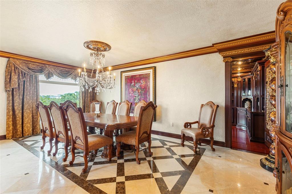 2115 Alexis Court Tarpon Springs, FL 34689 - Photo 20 of 100 a view of a dining room with furniture window and outside view