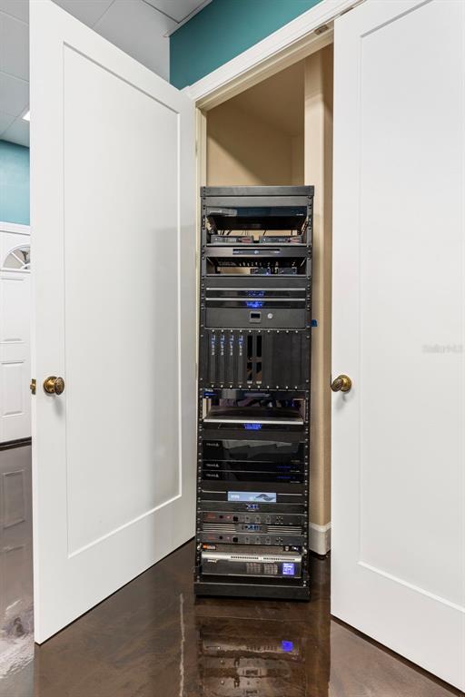 2115 Alexis Court Tarpon Springs, FL 34689 - Photo 80 of 100 a view of a hallway with wooden floor