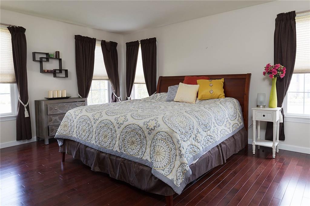 501 Hidden Court McKees Rocks, PA 15136 - Photo 13 of 25 The master bedroom boasts hardwood floors, an attached bath and a huge walk in closet!