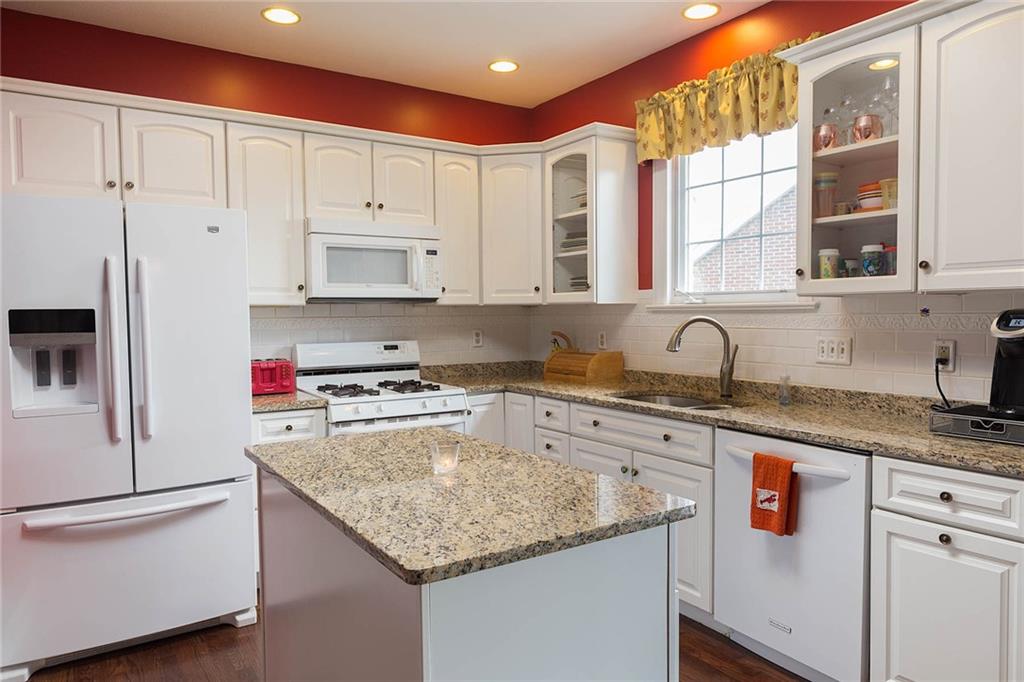 501 Hidden Court McKees Rocks, PA 15136 - Photo 5 of 25 Light and bright kitchen with plenty of storage and newer granite countertops!