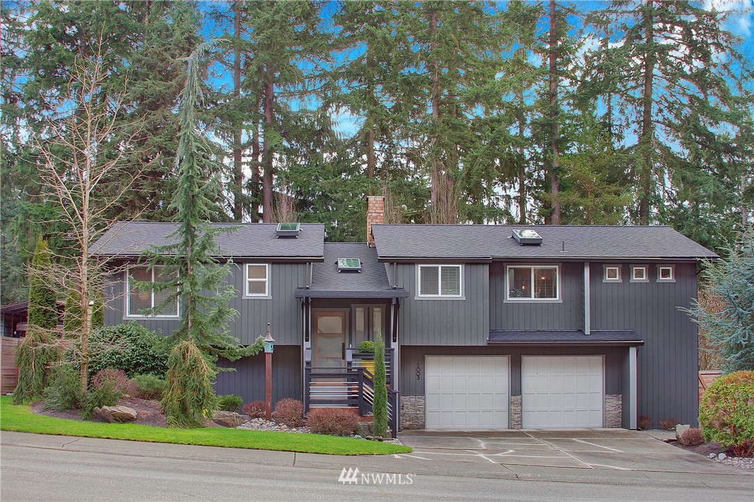 15003 Southeast 138th Place Renton, WA 98059 - Photo 1 of 38 front view of a house with a yard