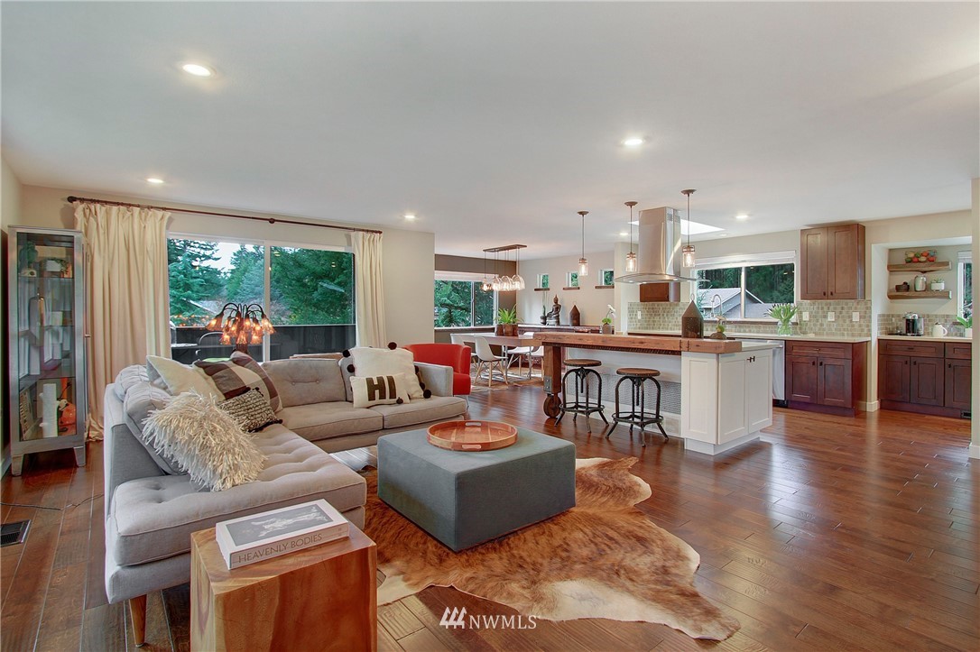 15003 Southeast 138th Place Renton, WA 98059 - Photo 16 of 38 a living room with furniture and a wooden floor