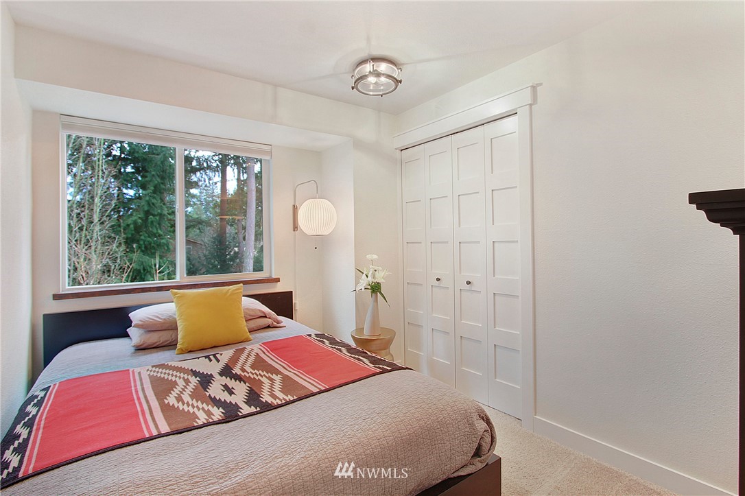 15003 Southeast 138th Place Renton, WA 98059 - Photo 20 of 38 a bedroom with a bed and window