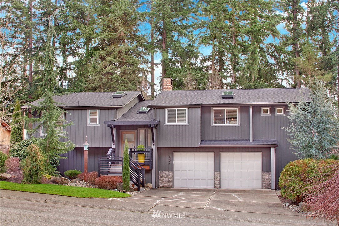15003 Southeast 138th Place Renton, WA 98059 - Photo 2 of 38 a front view of a house with garden