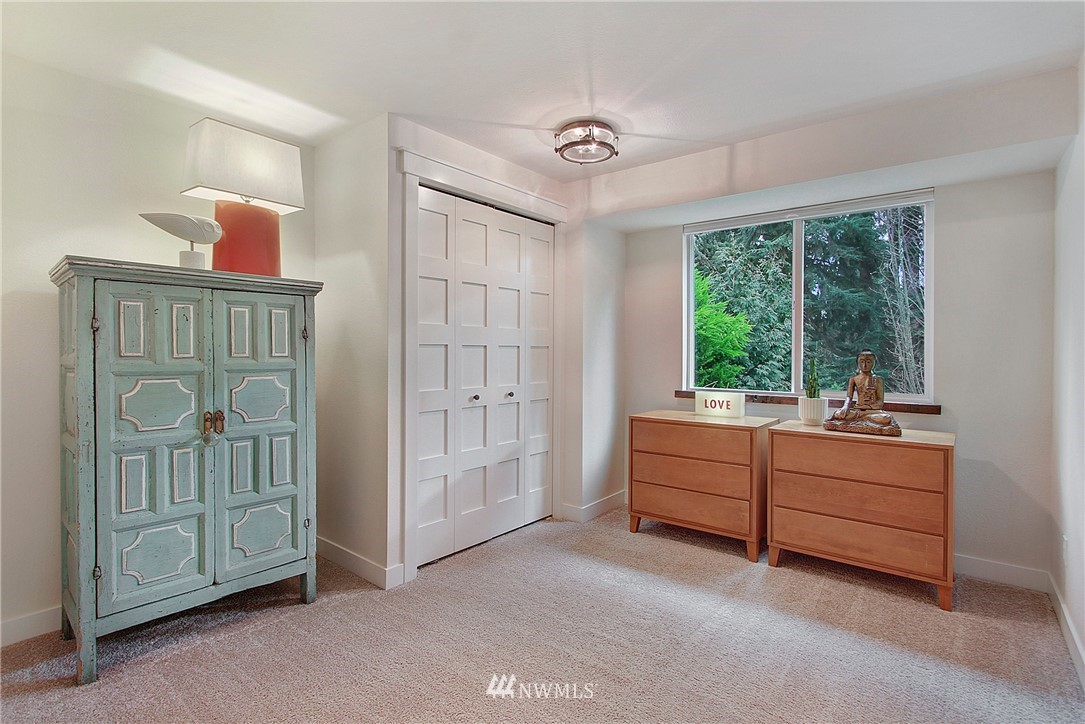 15003 Southeast 138th Place Renton, WA 98059 - Photo 21 of 38 a room with furniture and a window