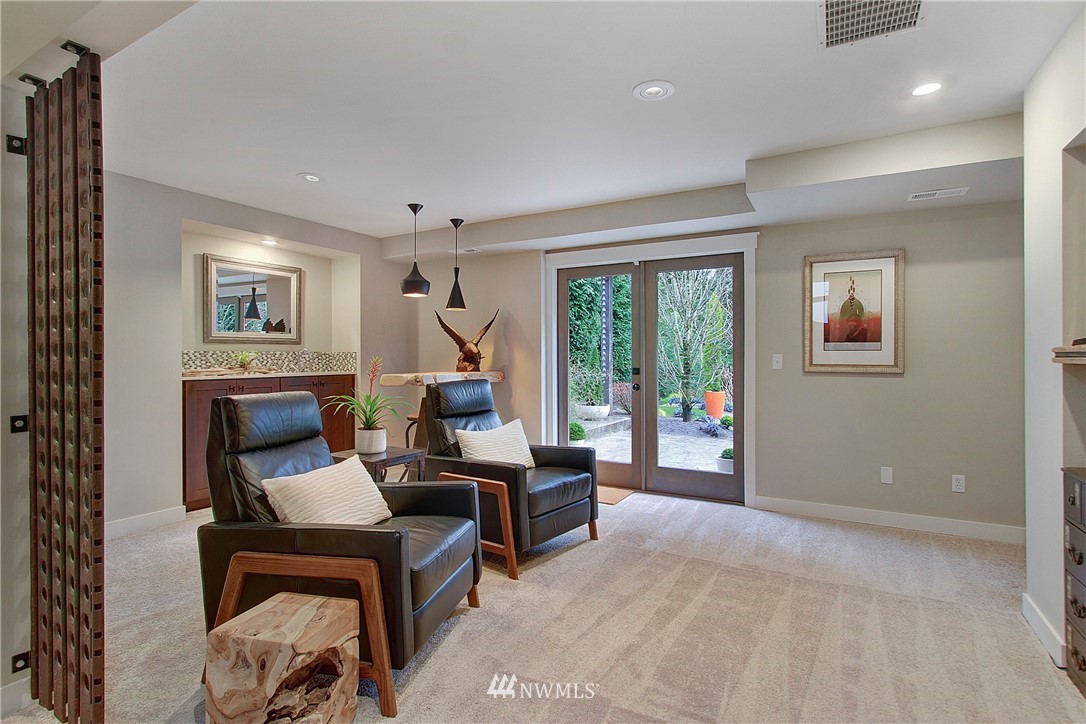 15003 Southeast 138th Place Renton, WA 98059 - Photo 22 of 38 a living room with furniture and a window