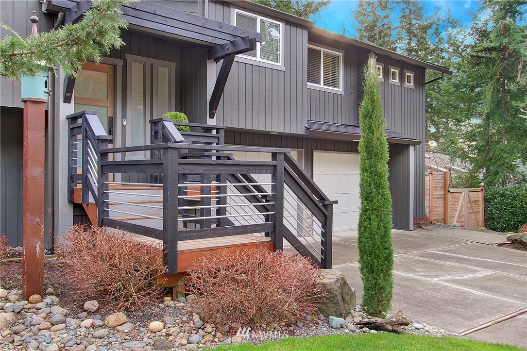 15003 Southeast 138th Place Renton, WA 98059 - Photo 26 of 38 a view of a chairs setting in front of a house