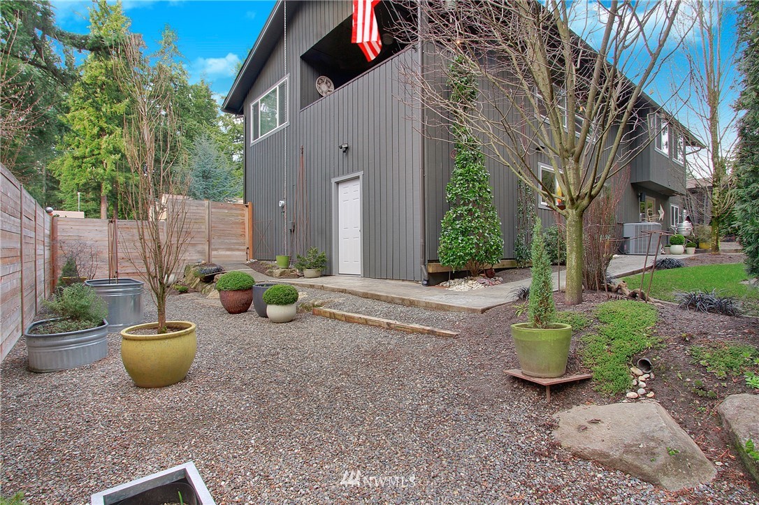 15003 Southeast 138th Place Renton, WA 98059 - Photo 29 of 38 a view of a backyard with garden and plants