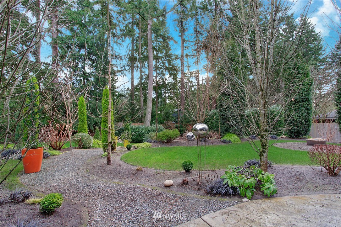 15003 Southeast 138th Place Renton, WA 98059 - Photo 31 of 38 a backyard of a house with yard and entertaining space