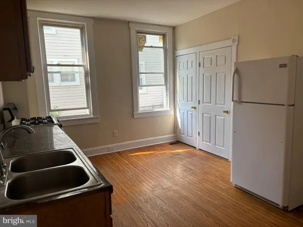 a view of livingroom with hardwood floor and window