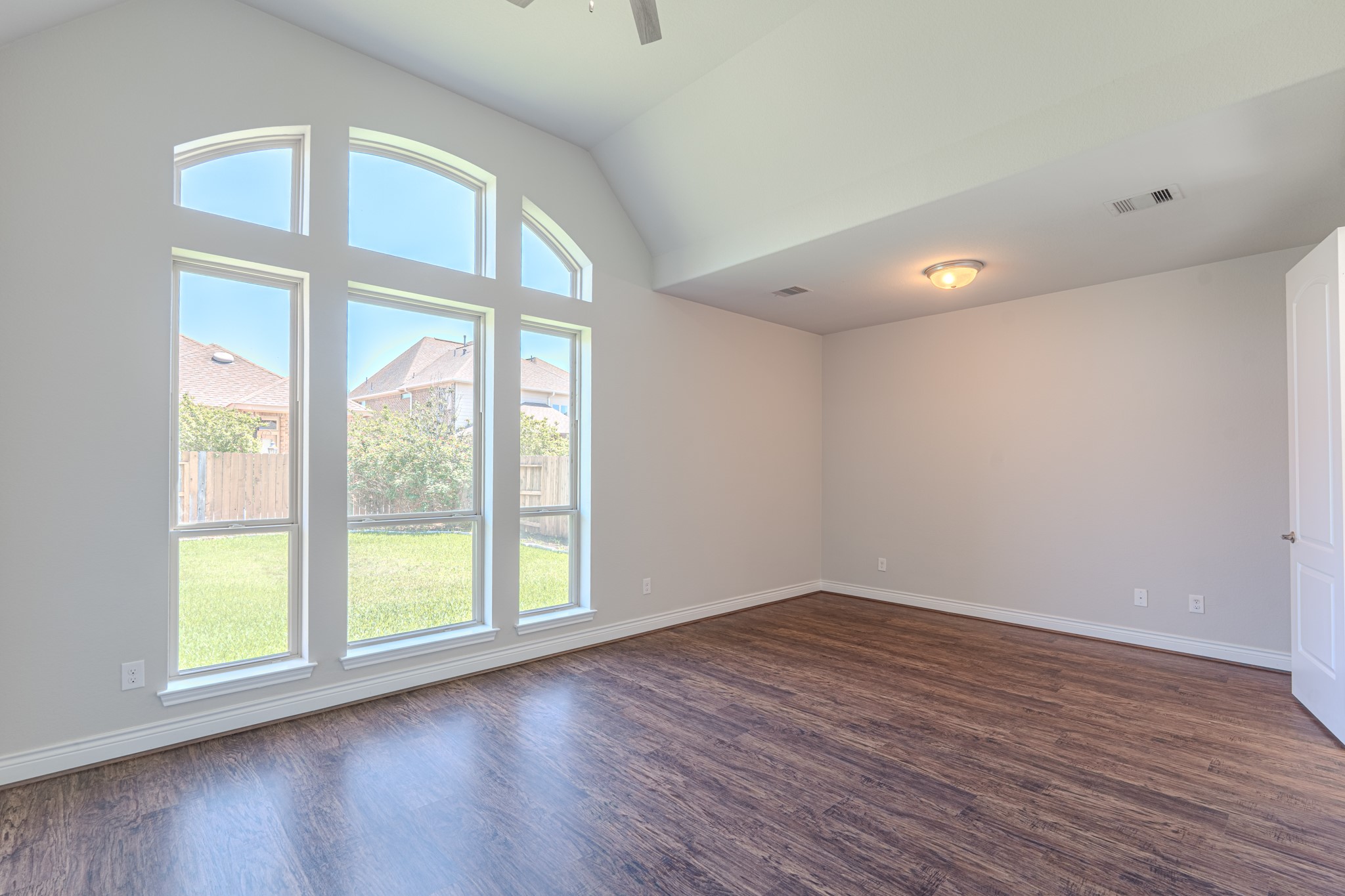 27918 Madison Bend Drive Spring, TX 77386 - Photo 23 of 50 a view of empty room with wooden floor and fan