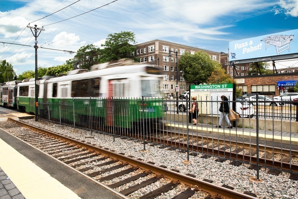 12 Ransom Road, Unit 7 Boston, MA 02135 - Photo 15 of 25 a front view of a house with a porch