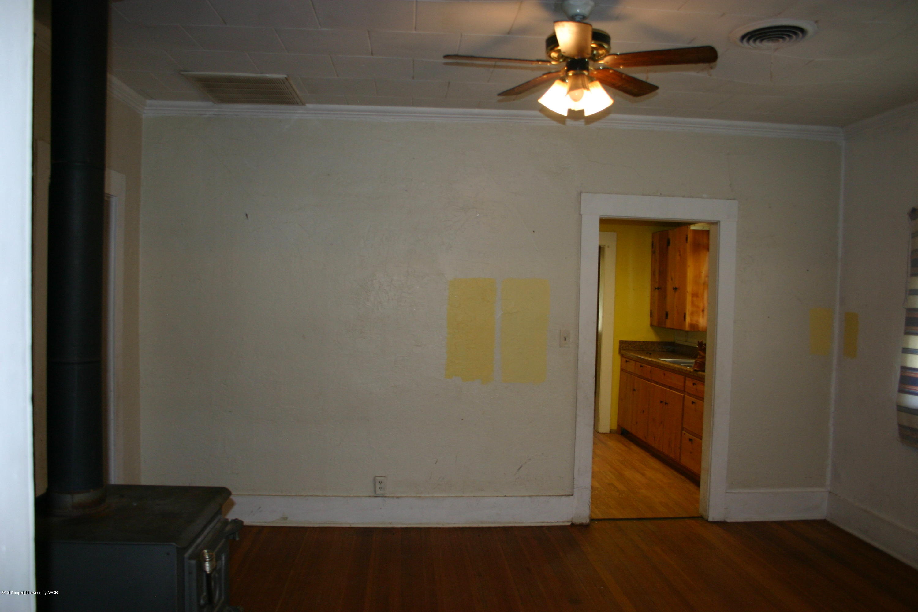 2214 South Taylor Street Amarillo, TX 79109 - Photo 11 of 30 a view of a chandelier fan and closet