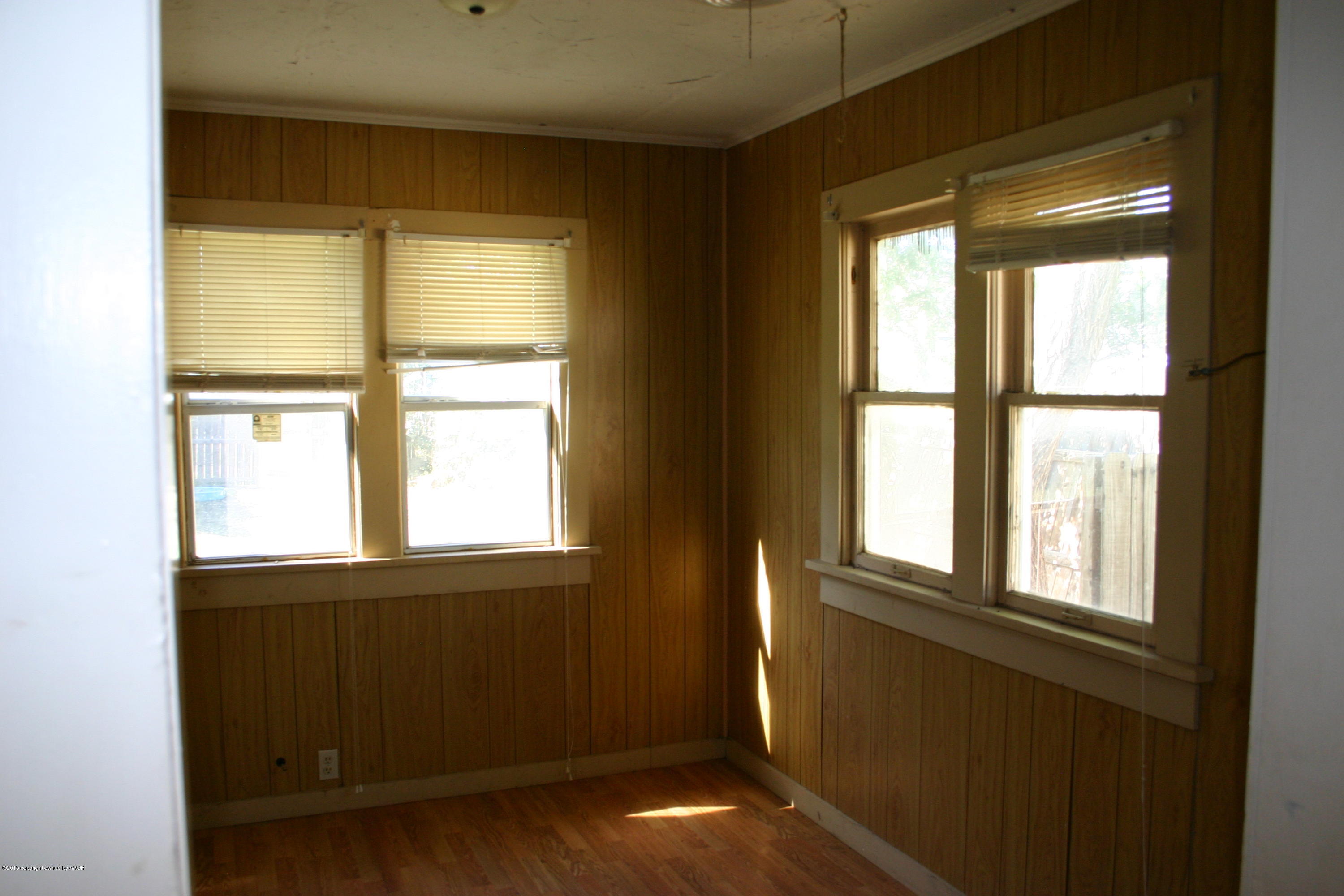 2214 South Taylor Street Amarillo, TX 79109 - Photo 15 of 30 a view of an empty room with a window