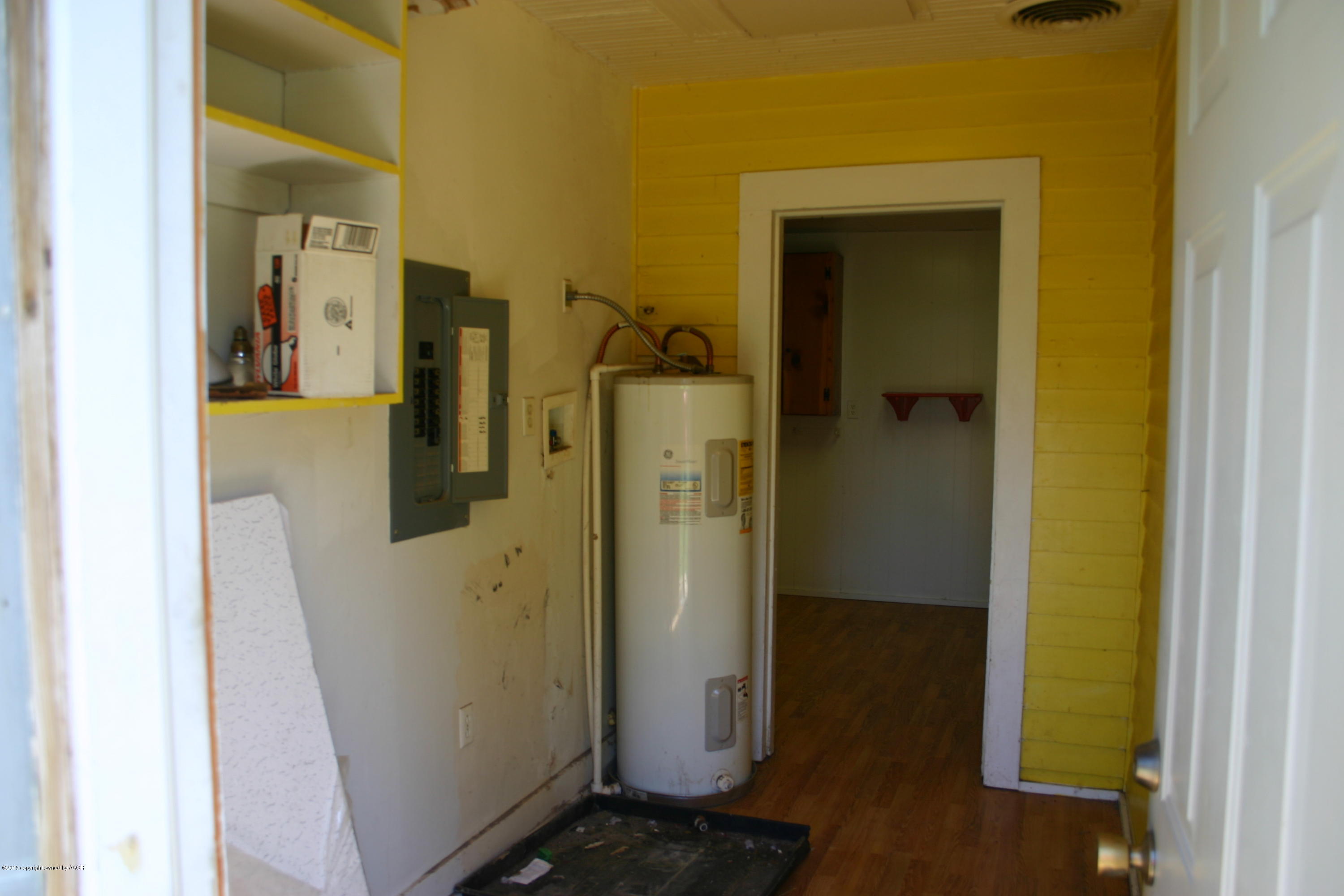 2214 South Taylor Street Amarillo, TX 79109 - Photo 16 of 30 a view of a storage & utility room with refrigerator
