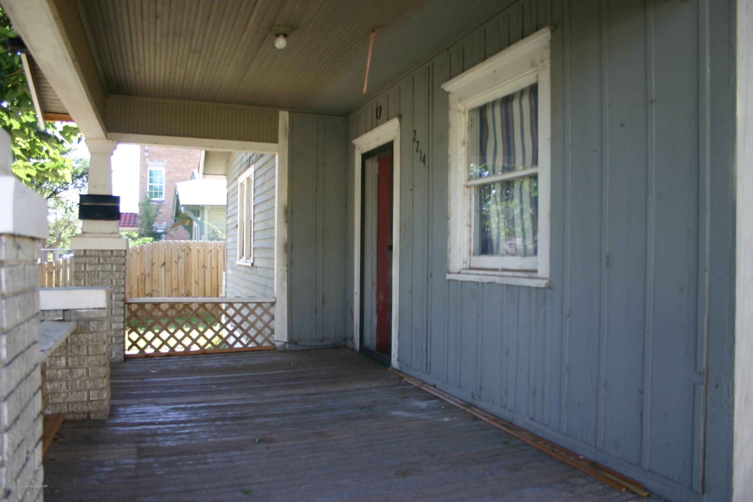 2214 South Taylor Street Amarillo, TX 79109 - Photo 3 of 30 a view of an entryway with wooden floor