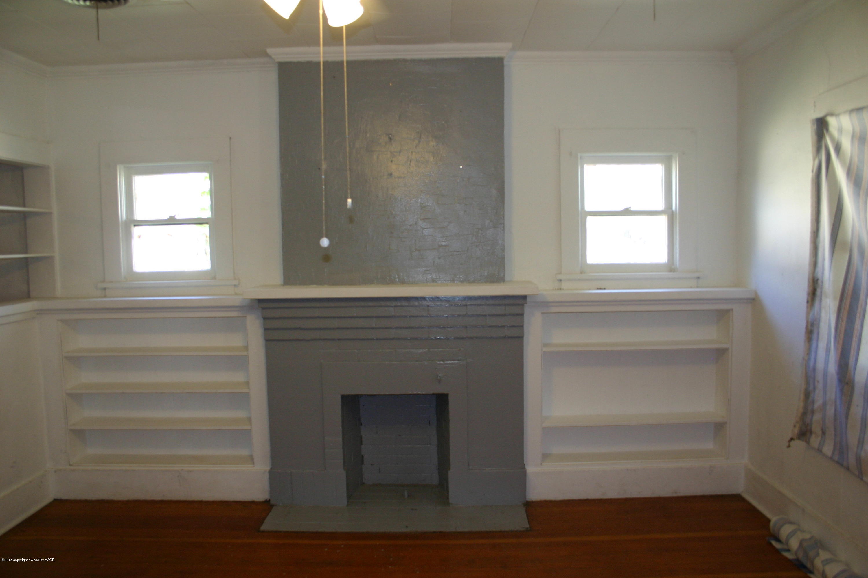 2214 South Taylor Street Amarillo, TX 79109 - Photo 7 of 30 a room with walk in closet and window