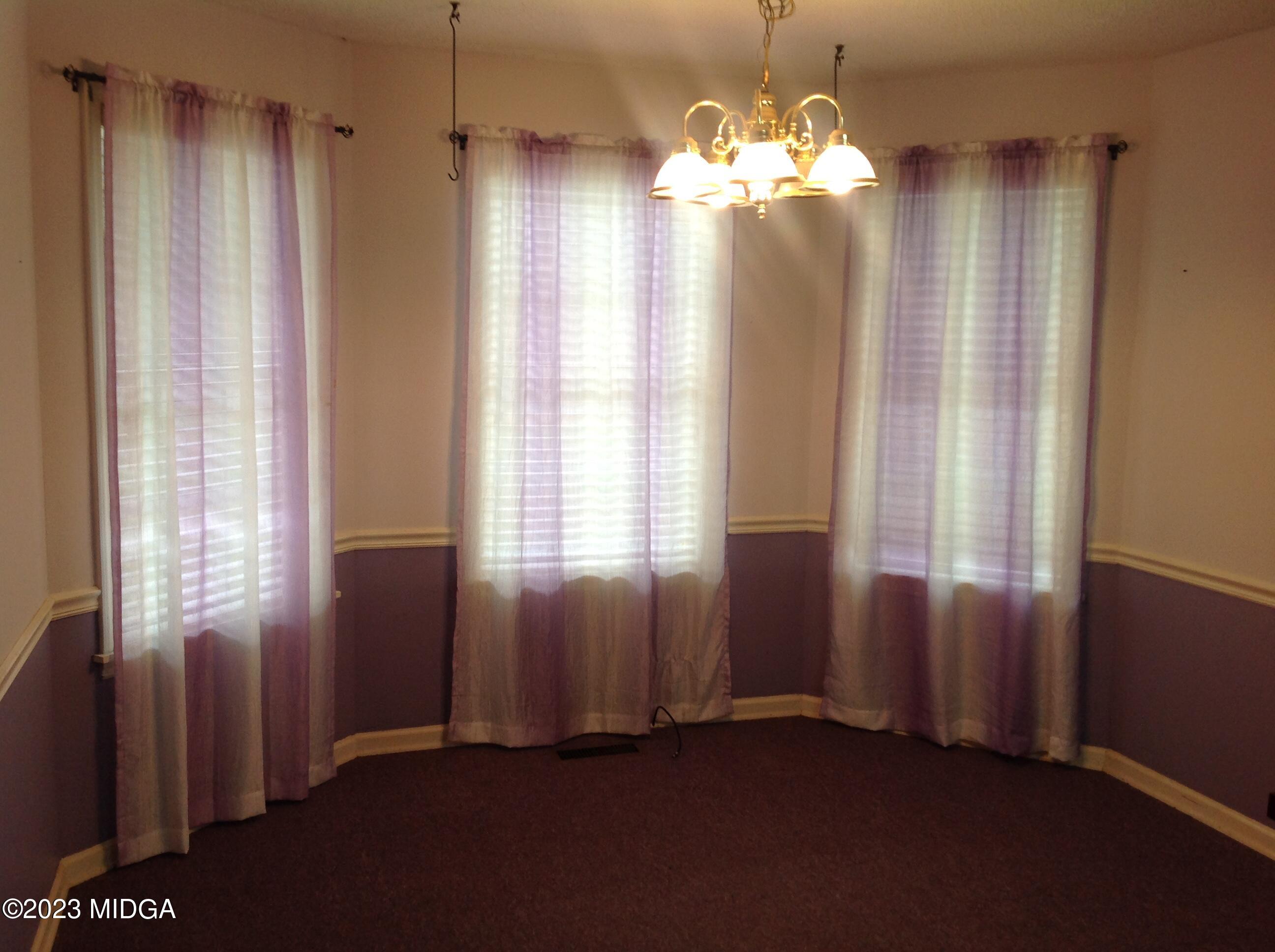 6251 Columbus Road Macon, GA 31206 - Photo 11 of 33 a view of empty room with window