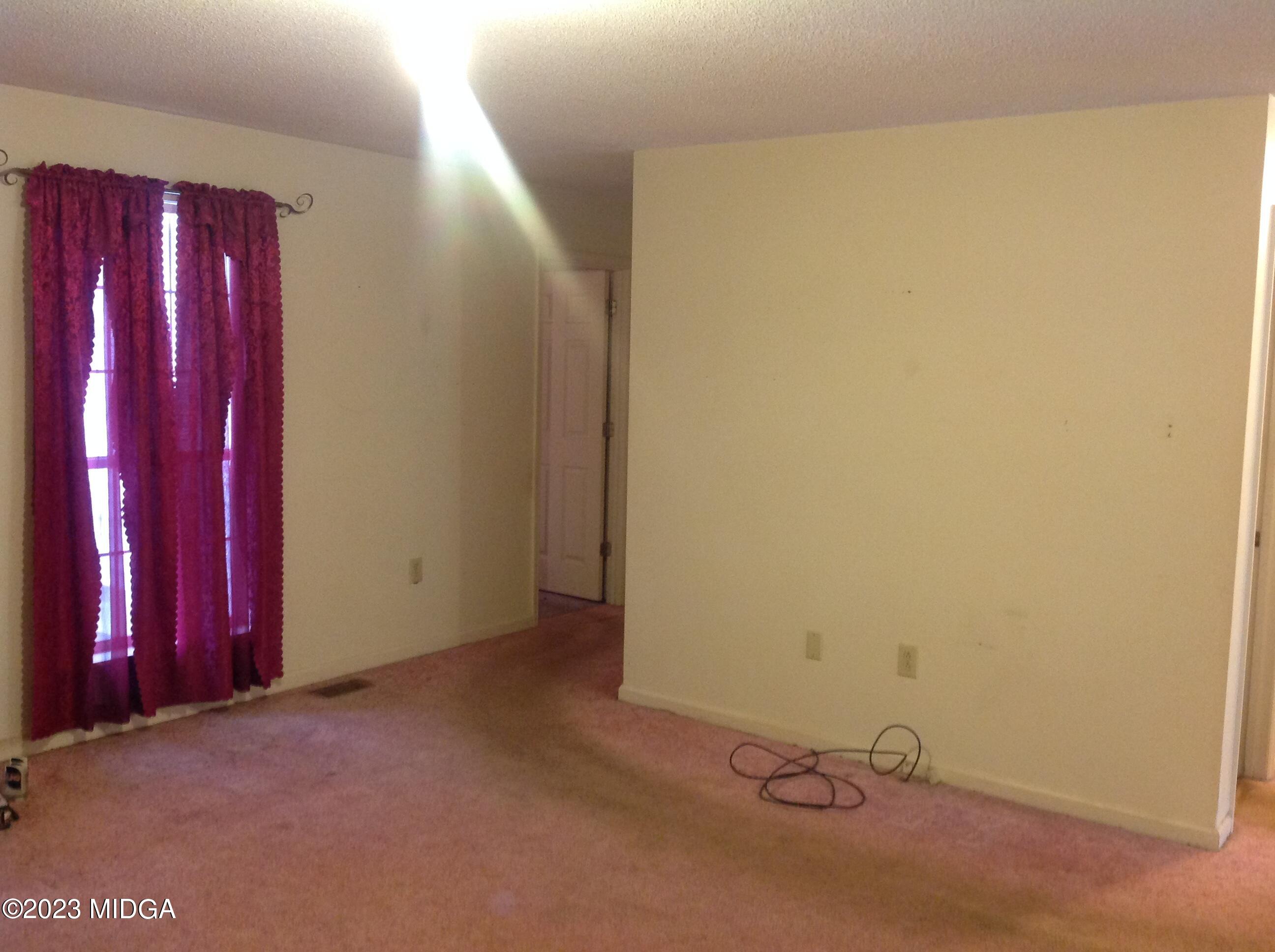 6251 Columbus Road Macon, GA 31206 - Photo 13 of 33 a view of a room with red walls