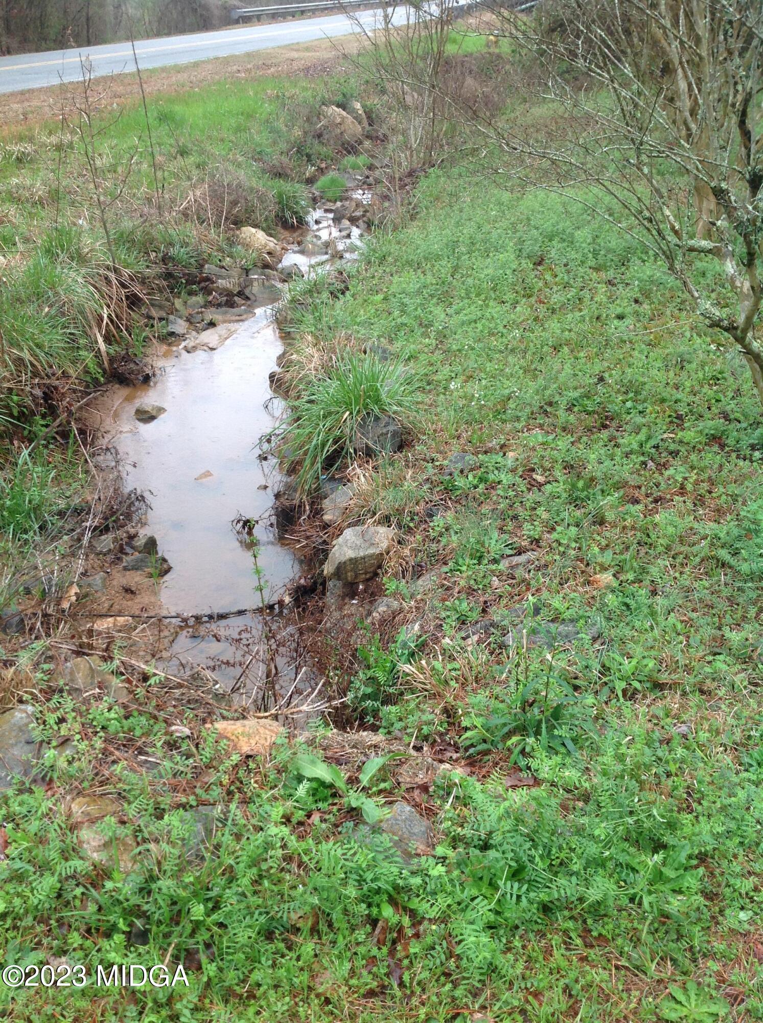 6251 Columbus Road Macon, GA 31206 - Photo 33 of 33 a view of a lake with beach and outdoor space