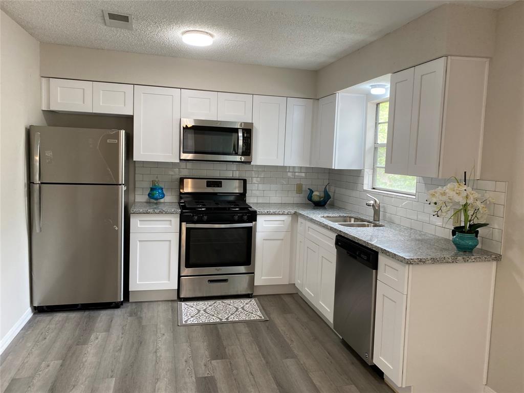Gorgeous fully renovated kitchen with new SS Appliances.  Be the first one to live in this amazing home.