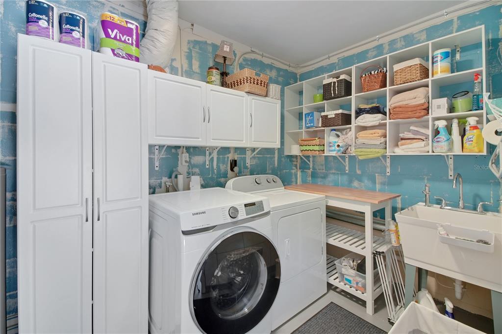 6122 East Glencoe Street Inverness, FL 34452 - Photo 21 of 37 a utility room with dryer and washer
