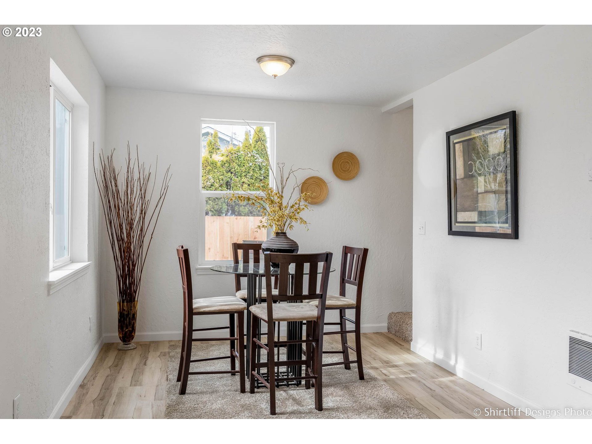 1446 E Street Springfield, OR 97477 - Photo 6 of 26 a view of a dining room with furniture and window