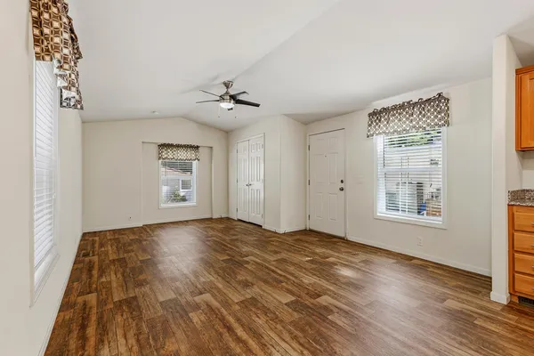 a view of an empty room and window