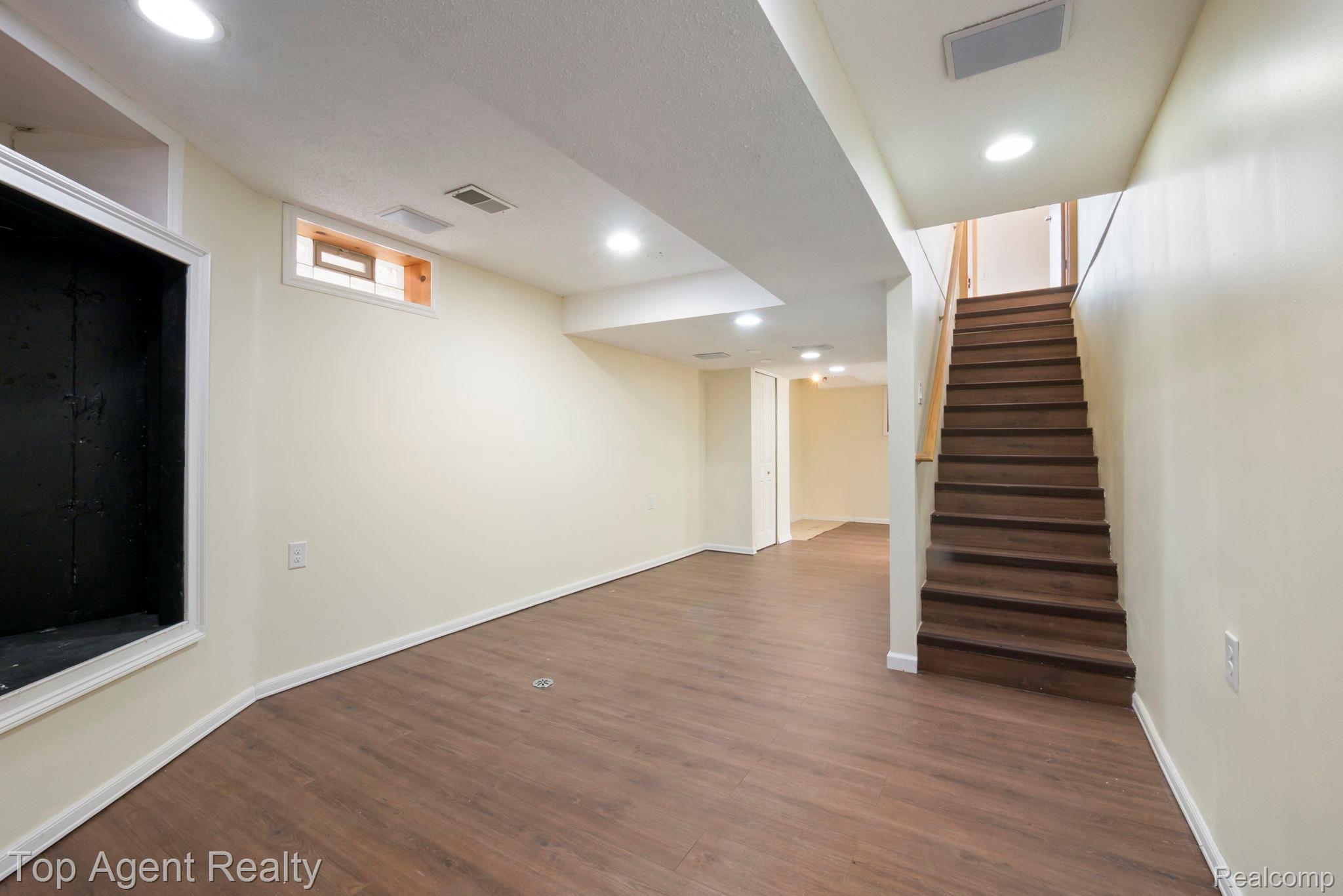 2018 John R Road Troy, MI 48083 - Photo 19 of 30 Basement with dark wood-type flooring and recessed lighting
