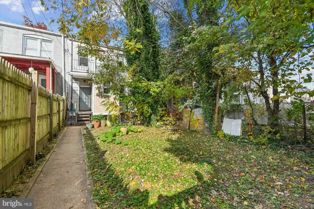 a view of a pathway with a building in the background