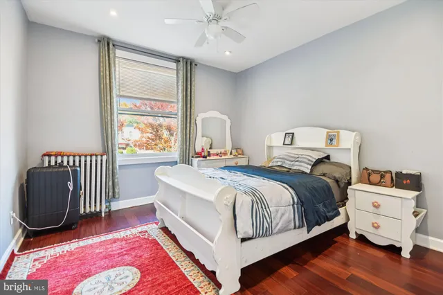 a bed room with a bed and a window