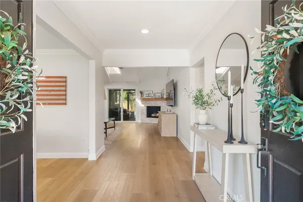 a view of a living room and a potted plant