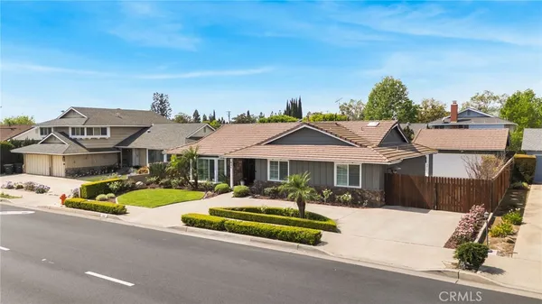 an aerial view of houses with outdoor space
