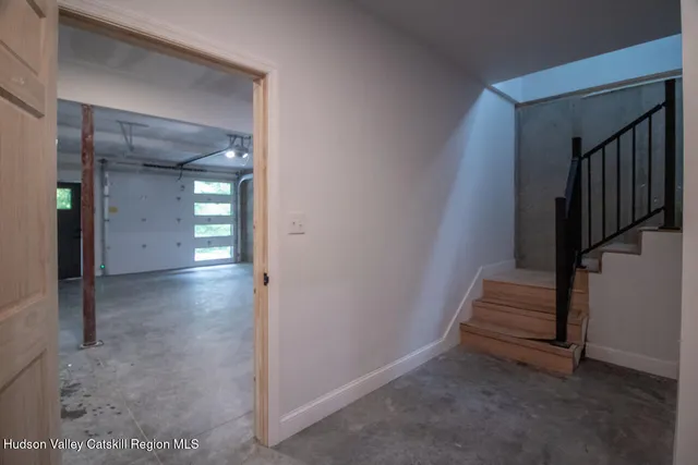 a aerial view of a house with a yard