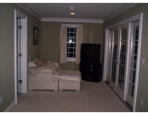 21 Davis Road Millbury, MA 01527 - Photo 11 of 12 a living room with furniture and a closet