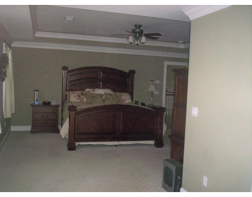 21 Davis Road Millbury, MA 01527 - Photo 8 of 12 a living room with furniture and a mirror