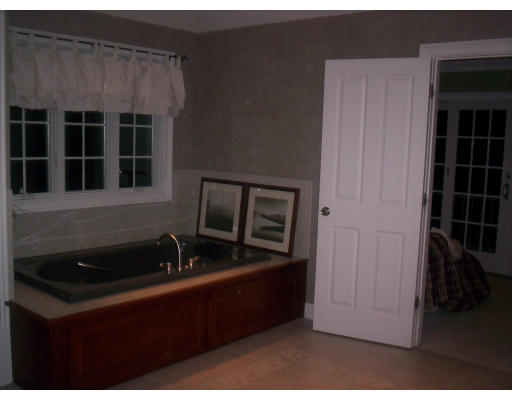 21 Davis Road Millbury, MA 01527 - Photo 9 of 12 a kitchen with a sink and cabinets