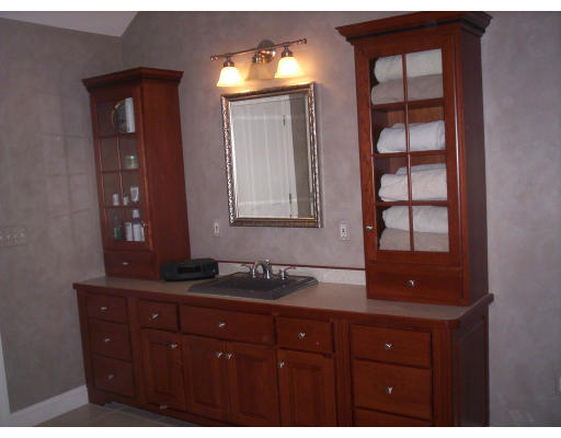 21 Davis Road Millbury, MA 01527 - Photo 10 of 12 a bathroom with a sink and a mirror