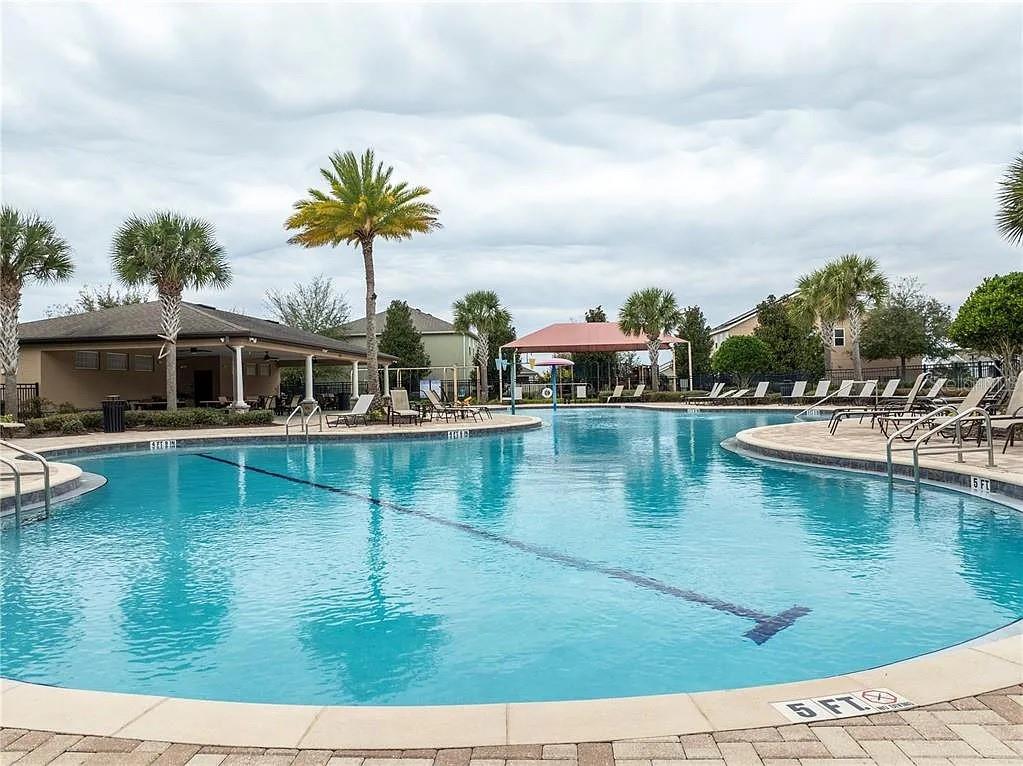 2085 Lula Road Minneola, FL 34715 - Photo 37 of 39 a view of a lake with a house